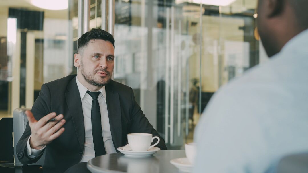 man in business suit negotiating